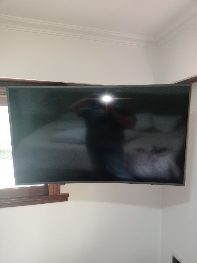 colgadores soportes tv pared ladrillo