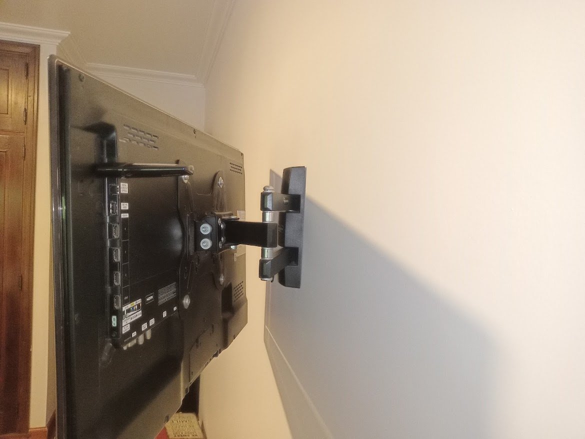 poner soporte tv pared ladrillo